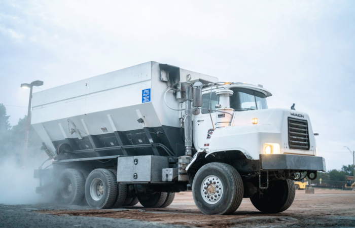 APCC, gray truck driving on road