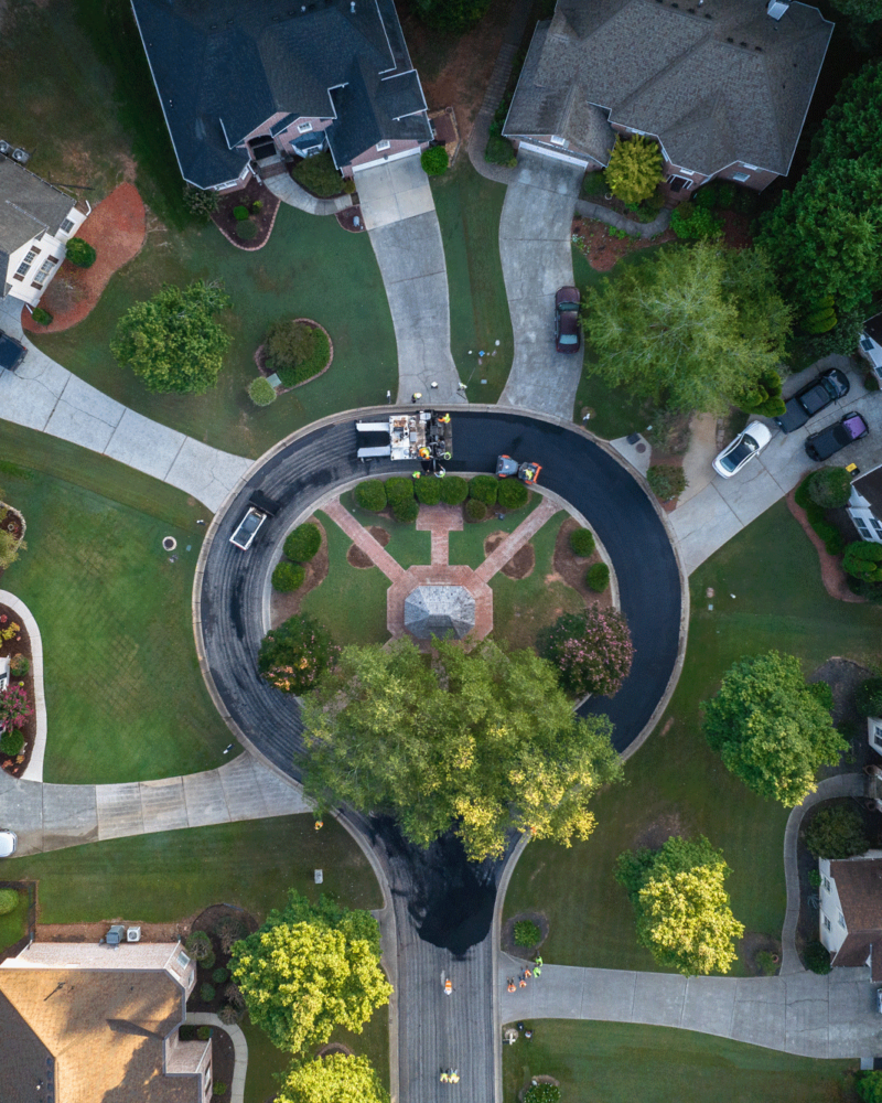 APCC, drone shot of neighborhood street, paving, 23137_BUILDWITT_2366