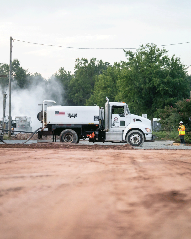 APCC, truck driving in dirt, 23137_BUILDWITT_0310